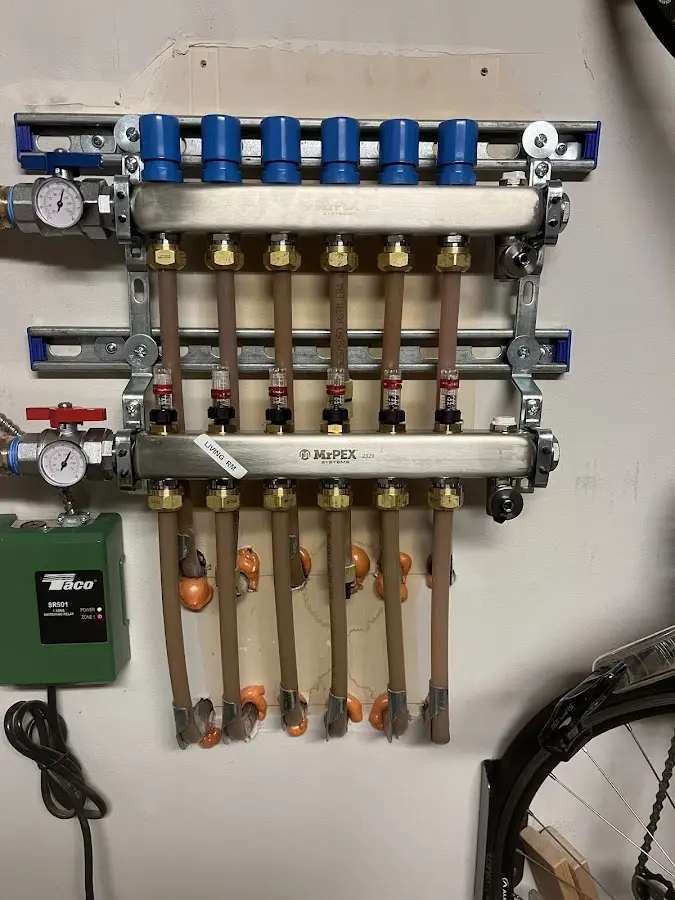 Plumber performing Gas Line Installation at a residential property in Old Jamestown