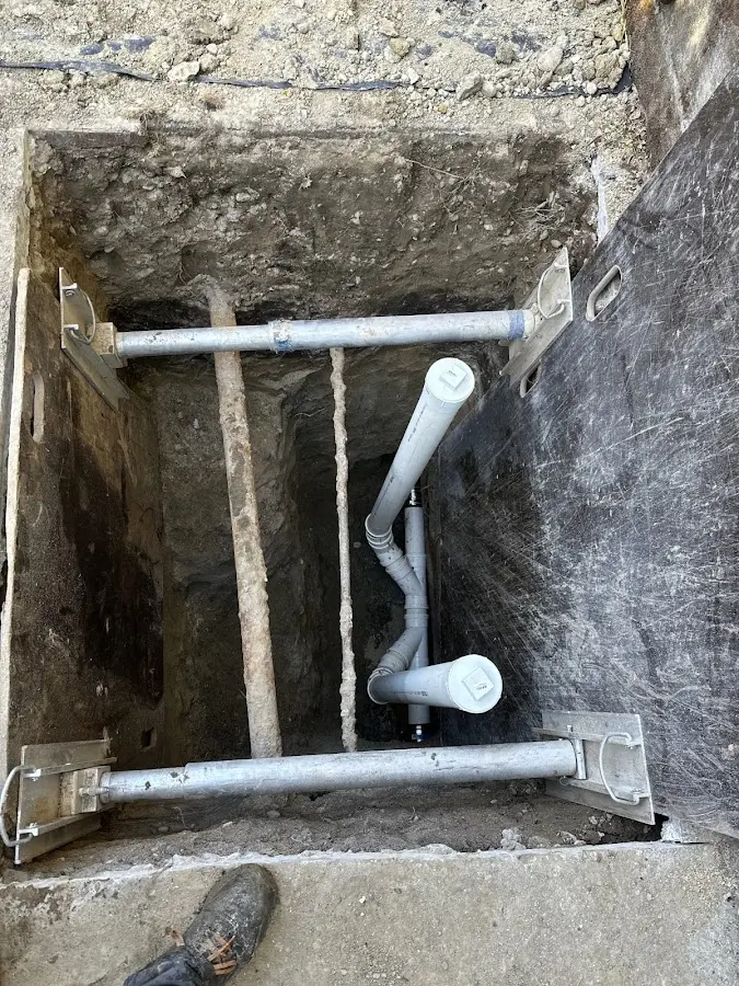 Experienced plumber completing Drain Cleaning work in Old Jamestown